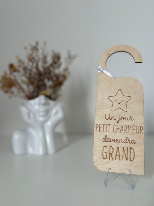 Accroche porte "Un jour petit charmeur deviendra grand"